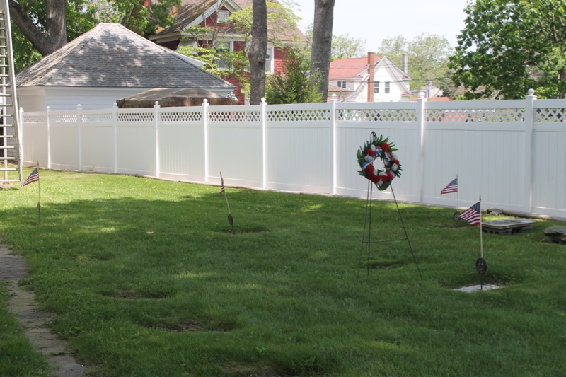 The old cemetery alongside the East Main Street church is barely recognizable as such. Photo: Denise Civiletti
