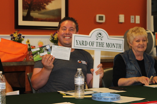 Winners will receive a "Yard of the Month" sign, pictured above. Photo: Denise Civiletti