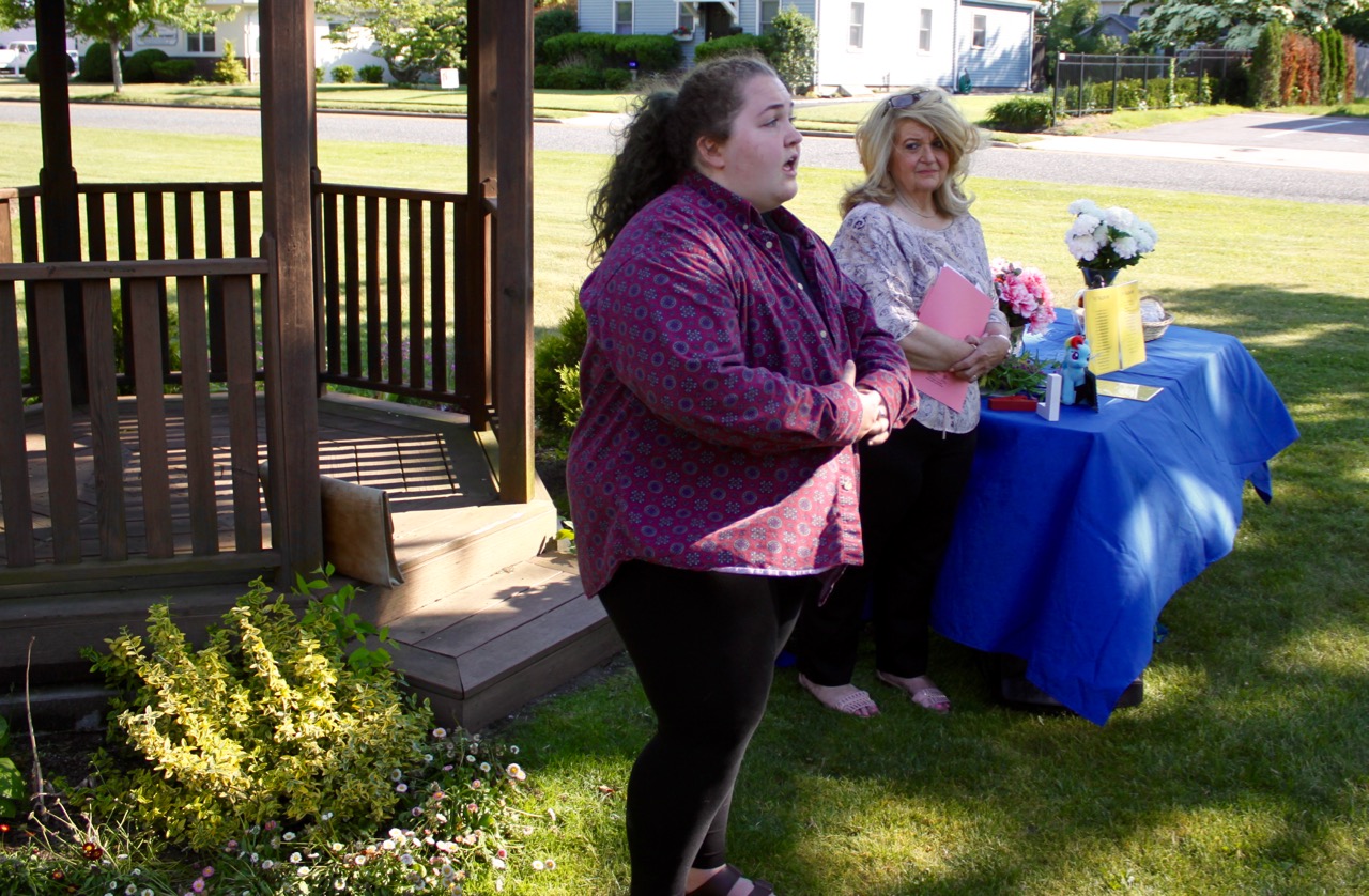 Nina Keller of South Jamesport speaking about discrimination against gays. Photo: Peter Blasl
