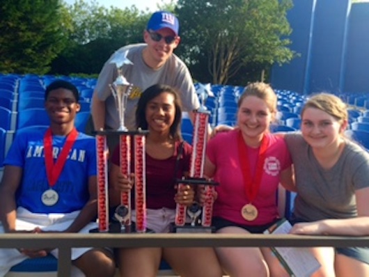 McGann-Mercy students display their trophies and medals Courtesy photo