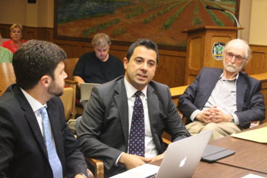 Georgica Green principal David Gallo, center, with project manager Matthew Ardito, left and architect Stephen Jacobs, discussing plans for his East Main Street apartment building today. Photo: Denise Civiletti