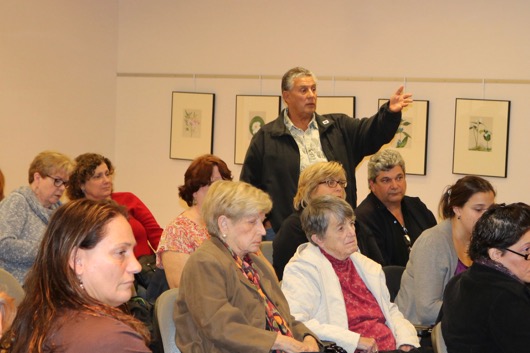 Joe Colao of Riverhead stood to complain about the reassignment of the library's ESL coordinator and other issues. Photo: Denise Civiletti