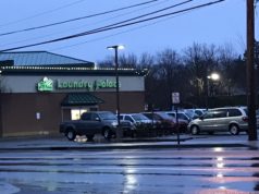 Cops: Woman robbed at gunpoint in Route 58 parking lot