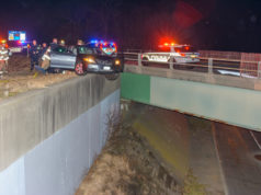 Wrong-way crash leaves car hanging over bridge on I-495 in Riverhead