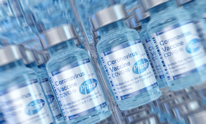 COVID-19 coronavirus vaccine bottles. Pfizer BioNTech vaccine injection drug against coronavirus virus. Vaccine development, clinical trial, vaccinating, treatment, 3D