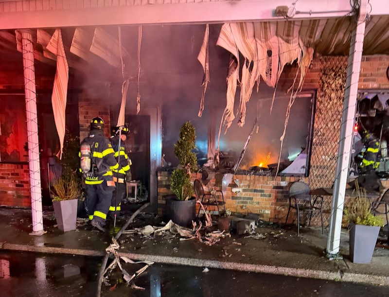 Wading River firefighters at the scene of a fire that broke out around 2 a.m. at Pazzo Wood Fired Pizza in Wading River.