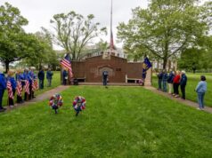 Scaled-back Memorial Day ceremony takes place after rain stops Monday afternoon