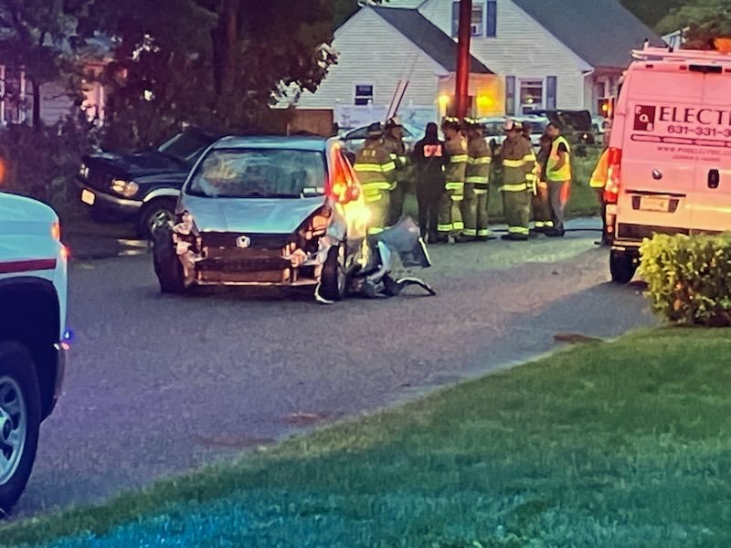 Riverhead woman charged with DWI after crashes involving parked cars, house