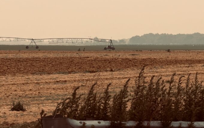 2026_0715_Hazy sky wildfire smoke - 1 Haze from Canadian wildfires is visible in the sky over a farm field off Doctors Path in Riverhead, as plumes of smoke drifted south across the region July 15. RiverheadLOCAL/Peter Blasl