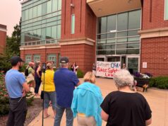 Local residents hold vigil for men shot by ICE in Texas and Maine