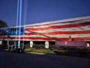 Artists paint U.S. flag mural on LIRR car for Sept. 11 anniversary in Riverhead