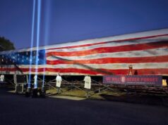 Artists paint U.S. flag mural on LIRR car for Sept. 11 anniversary in Riverhead
